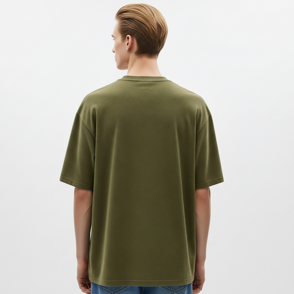 Person wearing an olive green t-shirt on a white background
